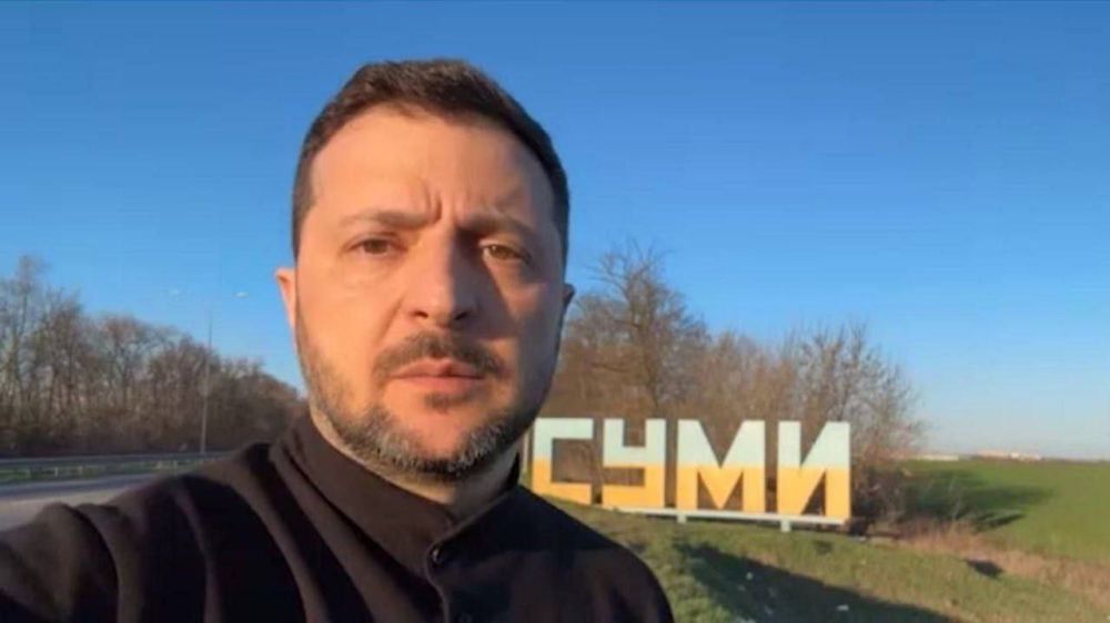 Зеленский на фоне названия города Сумы